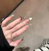 Parche de uñas francesas de alta calidad con diseño de explosión, con diamantes de imitación para llevar a mano, acabado con 30 piezas extraíbles.