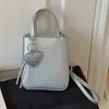 Bolsos de Diseño de Nicho para Mujer 2026 Nuevo Bolso Cruzado Versátil de Verano Bolso de Mano Súper Popular Bolso Cuadrado Pequeño para el Trabajo