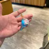 Chaveiro de acrílico transparente com areia movediça de desenho animado, pingente de bolsa, pequeno presente para crianças, decoração de carro