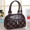 2026 Nuevo Mini Bolso de Mano para Mujer Bolso para Madres de Mediana Edad Bolsa de Compras Bolsa para Teléfono Billetera Bolso de Mujer