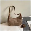 Bolsa de Design de Nicho em Forma de Meia-Lua Feminina 2025 Novo Estilo Coreano Retrô Ombro Único Transversal Pequena Bolsa Estilo Ocidental Bolsa de Dumpling Transfronteiriça