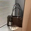 Bolso de mano retro brillante estilo coreano para mujer, nueva colección otoño/invierno 2026, moderno, gran capacidad, versátil, adecuado para ir al trabajo, bolso de hombro simple