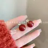 Pendientes rojos estilo Hong Kong retro para mujer, pendientes elegantes de alta calidad para Año Nuevo, pendientes de nicho francés populares en línea, otoño e invierno