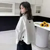 Camisa 2026 Otoño Nuevo Estilo Camisa de Dobladillo Irregular para Niños Mayores Estilo Coreano Top de Manga Larga para Primavera y Otoño