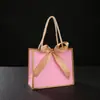Bolsa de papel de mano con lazo, bolsa de regalo de boda, caja de dulces en blanco de Phnom Penh, bolsa de regalo pequeña transfronteriza