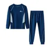Ropa interior térmica deportiva de lyocell y acetato para niños de otoño e invierno 2026 nuevo modelo conjunto de hogar de tops y pantalones de otoño para niños y niñas