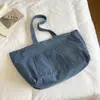 Bolsa de Mezclilla Rayada Estilo Perezoso de Gran Capacidad 2026 Nueva Versión Coreana Informal Versátil Ligera Bolso de Hombro para Estudiante