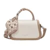 Bolso pequeño cuadrado de moda estilo coreano para mujer, nuevo modelo principios de otoño 2026, bolso de hombro moderno de bloques de color, bolso casual de alto valor para mujer