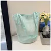 Bolsa de Lona Moda 2025 Bolsa Feminina Grande Capacidade Passeio Novo Estilo 2025 Versátil Mamãe Bolsa de Ombro Estilo Étnico Único