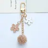 Ins estilo japonés flor de cerezo llavero colgante corazón de chica linda hueco cadena de teléfono funda para auriculares decoración de bolsa