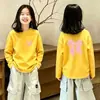 Camiseta de Manga Larga Base para Niña Primavera y Otoño 2026 Nueva 100% Algodón Cuello Redondo Linda Talla Mediana y Grande Ropa Superior Holgada para Niños