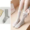 Calcetines de algodón peinado para mujer de primavera y otoño hasta la pantorrilla, calcetines básicos lisos de moda para mujer, calcetines blancos apilables