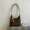Bolso de Mujer 2026 Verano Nuevo Elegante Retro Bolso Cubo de Hombro Cruzado Bolso Cruzado Melade