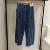 Pantalones de Mezclilla Lavada de Corte Holgado para Mujer Otoño 2026, Modelo Colaborativo, Pantalones de Pierna Ancha en Forma de Guadaña 488450