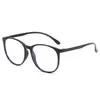 Gafas planas de moda anti luz azul con montura redonda, casuales y lindas, realzan el rostro, versátiles para fotografía callejera y uso casual