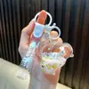 Chaveiro de panda cheio de óleo, garrafinha com areia movediça de maçã, pingente de bolsa, chaveiro de carro, prêmio de máquina de pegar, pequeno presente