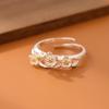 Moda temperamento fresco pequeño flor de ciruelo margarita flor anillo de apertura ajustable mujeres mayoreo