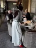 Shi Jian Malha de Base Slim Fit Lã Redonda Leve Fina Macia Pegajosa Integrada Sem Costura Feminina 2026 Outono Novo Estilo 32032