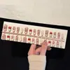 Uñas postizas hechas a mano estilo celebridad de internet Uñas postizas con acabado que realza el blanco Pegatinas de arte de uñas removibles Uñas para fotos diarias