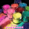 Polvo de Brillo Dorado Fantasía de Alto Brillo Importado de 0.2 mm Serie de Colores Transparentes Oro Fantasía Luz Materiales Hechos a Mano para DIY Pegamento para Uñas Brillo