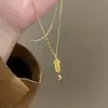 Acero de Titanio Color Duradero Nuevo de Gama Alta Lujo Accesible Collar para Mujer Barra de Oro Estilo Popular Colgante Elegante Firmado Superior Cadena de Clavícula Tendencia