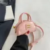 Bolso de Mujer con Letras de Bolos de Nicho 2025 Nuevo Bolso Caja Media Luna para Viajes Cotidianos Mini Portátil Cruzado Bolso para Niños de Moda