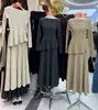 Conjunto de Duas Peças Outono e Inverno Estilo Preguiçoso Relaxado Estilo Coreano Gentil Top de Tricô de Um Ombro com Saia Emagrecedora