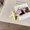 Presilha de Cabelo Estrela do Mar Flor de Cerejeira Super Fada Transfronteiriça Europeia e Americana Acessório de Cabelo com Atmosfera Praiana Presilha de Cabelo para Feriado Presilha de Cabelo de Pérola para Mulheres