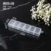 Caja de plástico transparente multi-compartimentos para arte de uñas, almacenamiento de joyería y empaque sellado de cápsulas de medicina