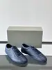 Comercio exterior transfronterizo cuero genuino zapatillas de entrenamiento alemanas BC patrón simple de lichi zapatillas de caña baja zapatos casuales para hombre en stock al por mayor