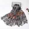 Bufanda de longitud media bufanda moda estampado de leopardo mujer primavera y otoño alta gama nuevo protector solar chal bufanda fábrica venta al por mayor venta directa