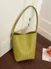 Bolso de mano tejido con patrón retro transfronterizo para mujer, nuevo y elegante bolso de mano de alto valor para el día a día, moderno bolso de hombro único para madre e hija