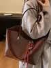 Bolso bandolera simple de gran capacidad para el día a día, nuevo modelo principios de otoño 2026, bolso tote de color liso único y dulce, bolso de hombro elegante