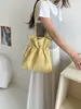 Bolso de Hombro Plegado con Cordón de Piel Suave Modelo 2026 para Mujer, Bolso Cubo de Gran Capacidad Estilo de Nicho de Gama Alta para el Viaje Diario