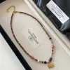 Colar de Elefante Pequeno da Ilha da Fantasia com Contas, Corrente de Clavícula Elegante e Moderna para Outono/Inverno com Pedra Olho de Tigre Melard, Colar de Elefante Auspicioso