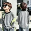 Ropa interior térmica de forro polar a bloques de color a rayas para niños Otoño e Invierno 2026 Nueva camiseta de manga larga cálida de invierno para niños