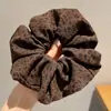 Temperamento Outono Inverno 2026 Novo Prendedor de Cabelo Estilo de Cabelo Atmosfera Francesa Prendedor de Cabelo Xadrez Alta Elasticidade Anel de Cabelo de Intestino Grosso Acessórios de Cabelo