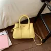 Bolso tipo cubo simple y elegante para mujer, estilo coreano, adecuado para el trabajo y para ir al trabajo, bolso de hombro, nuevo bolso cruzado de moda 2026 para mujer
