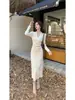 Vestido largo de punto estilo francés con cuello halter en V y manga larga, diseño elegante, nuevo modelo de otoño e invierno, adecuado para uso diario y adelgazante