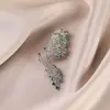 Novo broche estilo antigo de alta qualidade ins para mulheres estilo chinês leque borla pino de terno placket de pressão cheongsam corsage atacado