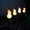 Nueva lámpara solar de césped navideña muñeco de nieve de arroz EVA LED jardín jardín paisaje iluminación de piso
