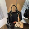 Moda Transfronteriza Versátil Bolso Pequeño Cuadrado 2026 Modelo Nuevo Bolso Cruzado de Mano Textura de Alta Calidad Exquisito Elegante Retro Bolso Pequeño
