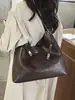 Bolso grande de mujer nuevo de principios de otoño Yuezhi 2026, bolso tote de retazos moderno con cremallera, bolso de hombro para mujer para viajar