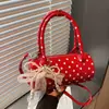 Transfronteiriço 2026 Novo Modelo Exquisito Versátil Tendência Nicho Bolsa de Bolinhas Bolsa Transversal Feminina Bolsa de Mão Popular Bolsa Cilíndrica