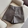 Nuevos shorts de otoño/invierno para mujer, pantalones casuales de cuero de Haining de poliuretano de cintura alta, corte ajustado, línea A, pierna ancha, corte bootcut