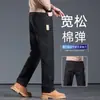 Jeans negros de alta gama para hombre, corte recto holgado, pantalones casuales versátiles para hombre otoño e invierno 2026, pantalones largos de primavera y otoño