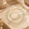 Set de collar y pulsera de concha marina y circón de moda europea y americana transfronterizo, joyería de cuello en capas de lujo ligero, venta al por mayor de accesorios