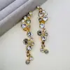 Pin de Oreja Asimétrico Brillante con Adorno de Cristal de Lujo Accesible de Alta Gama Oscar Fashion para Mujer