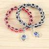 Aleación Palma Hueca Ojos Azules Colorido Color Mezclado Colgante de Cuentas Pulsera Elástica Joyería Simple para Pareja en stock