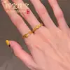 El mismo estilo que el nuevo anillo de flor de vid dorada estilo chino de la joyería, diseño artístico retro exquisito con un estilo nacional, ajustable para usar en capas